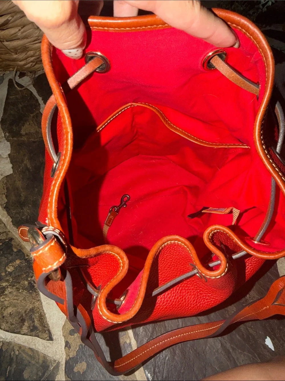 Dooney & Bourke Red Pebbled Leather Drawstring Bucket with Brown Trim